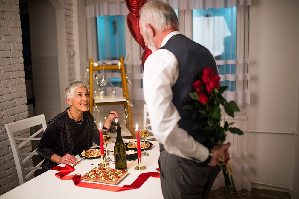 Man bringing roses to his wife
