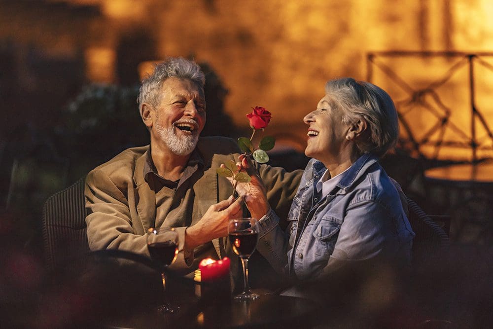 Couple enjoying Valentine's Day on their patio