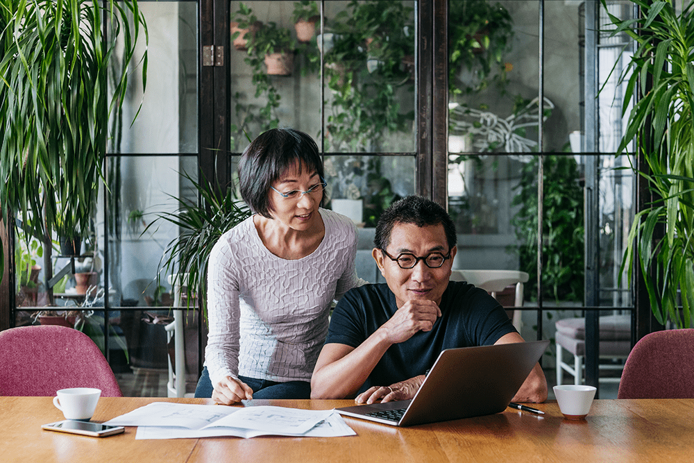 Couple looking at retirement plan together