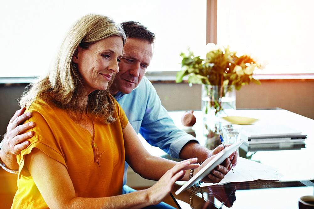 Couple looking at their tax documents together