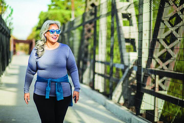 Woman enjoying a walk on a beautiful day