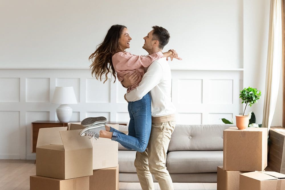 Couple excited after buying their first home