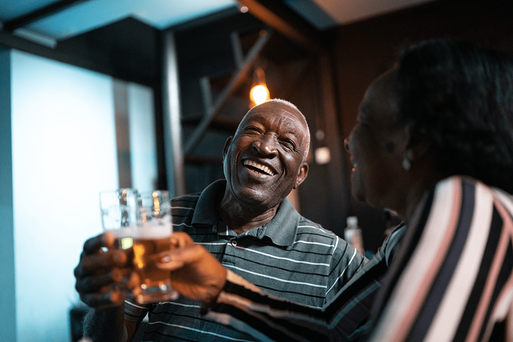 Couple drinking beer in a brewery