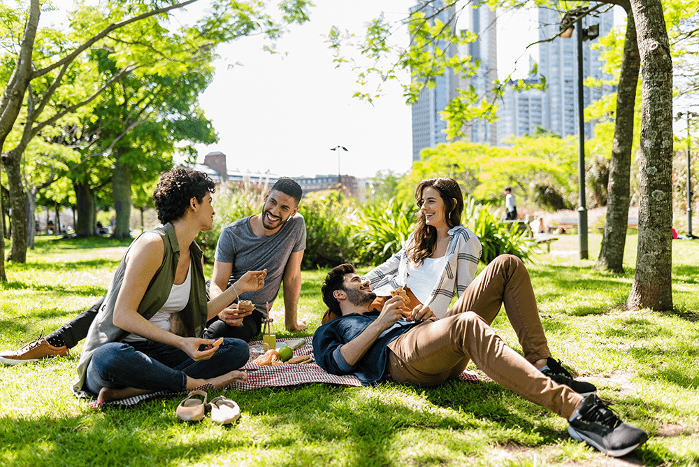 Group of friends enjoying a picnic together