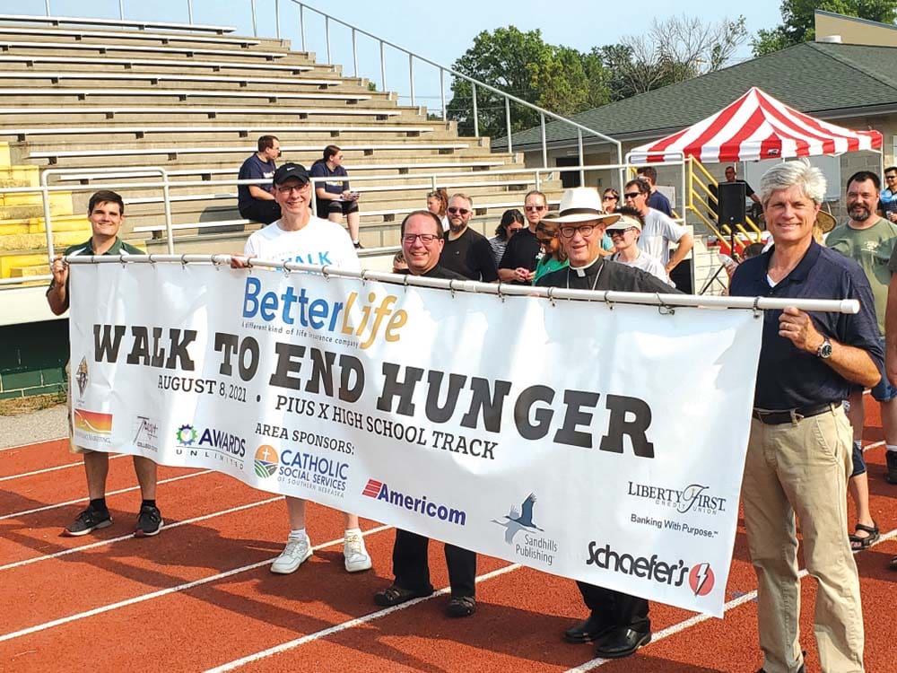 BetterLife CEO Dan Shinnick walking with other BetterLife Walk to End Hunger organizers and attendees 