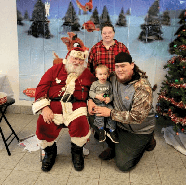 The Olmsted Family Visiting Santa