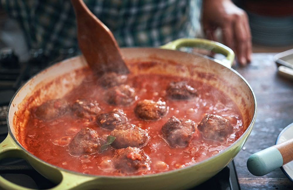 Preparing meatballs on the stove