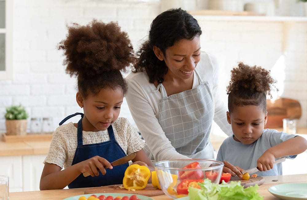 Cutting veggies in the kitchen